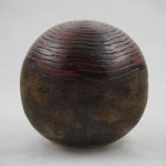 Sphère rouge et or